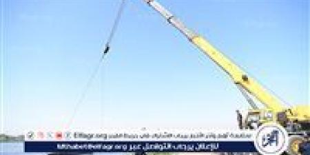 الدفع بمعدات ثقيلة لاستخراج السيارة الغارقة في حادث معدية دشنا - الكويت الاخباري